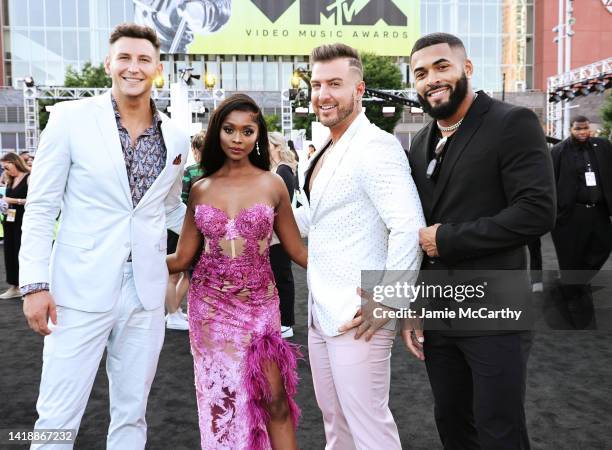 Blake Horstmann, Trina Njoroge, Mike Mulderrig and Johnny Middlebrooks attend the 2022 MTV VMAs at Prudential Center on August 28, 2022 in Newark,...