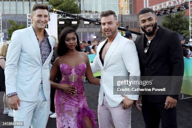 Blake Horstmann, Trina Njoroge, Mike Mulderrig and Johnny Middlebrooks attend the 2022 MTV VMAs at Prudential Center on August 28, 2022 in Newark,...