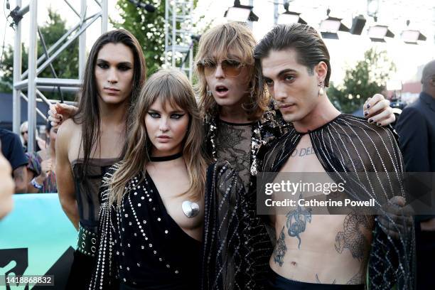 Ethan Torchio, Victoria De Angelis, Thomas Raggi and Damiano David of Maneskin attend the 2022 MTV VMAs at Prudential Center on August 28, 2022 in...