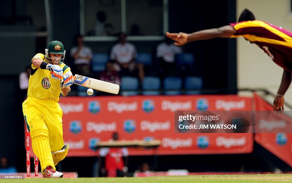 Australian cricketer Mike Hussey plays a