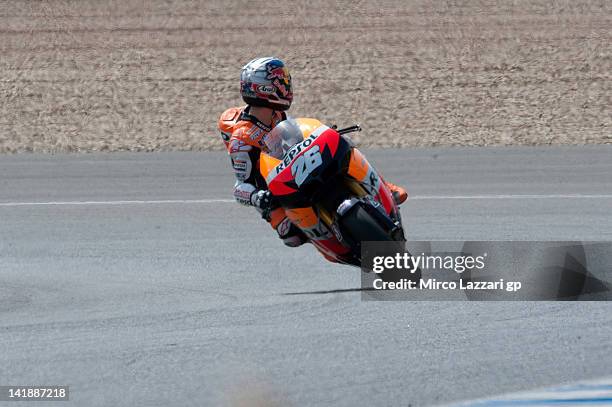 Dani Pedrosa of Spain and Repsol Honda Team heads down a straight and looks backduring the third day of testing of MotoGP Tests In Jerez at Circuito...