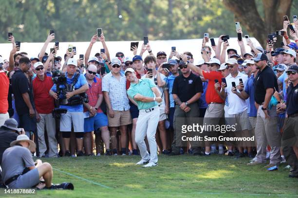 Rory McIlroy of Northern Ireland plays a shot on the 16th hole during the final round of the TOUR Championship at East Lake Golf Club on August 28,...