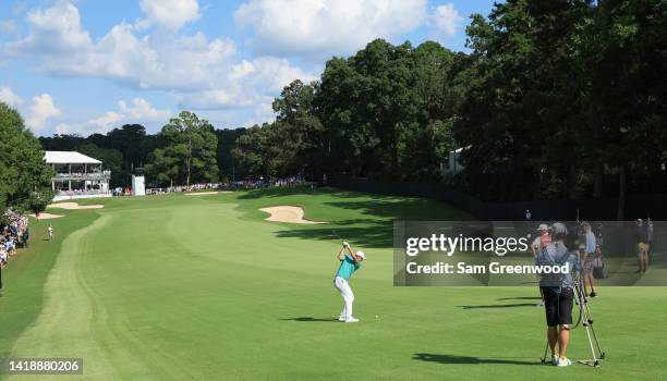 Scottie Scheffler of the United States plays a shot 1during the final round of the TOUR Championship at East Lake Golf Club on August 28, 2022 in...