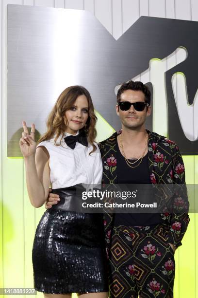 Sarah Ramos and Dylan O'Brien attend the 2022 MTV VMAs at Prudential Center on August 28, 2022 in Newark, New Jersey.