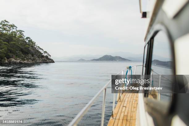 yachting concept. view of boat with beautiful sea view around, background with copy space - spartan cruiser stock pictures, royalty-free photos & images