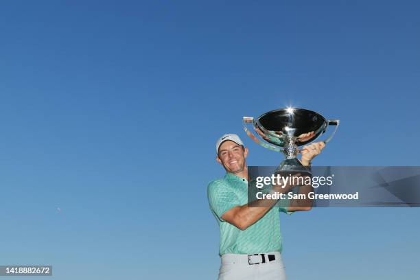 Rory McIlroy of Northern Ireland celebrates with the FedEx Cup after winning during the final round of the TOUR Championship at East Lake Golf Club...