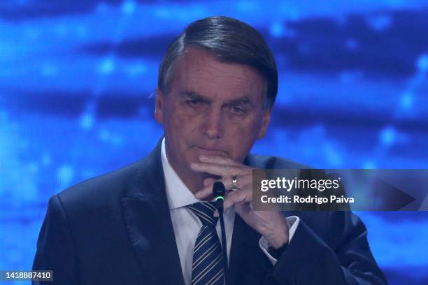 President of Brazil and presidential candidate Jair Bolsonaro gestures during the first presidential debate ahead of October 02 elections at TV...