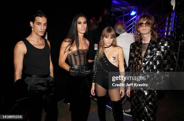 Damiano David, Ethan Torchio, Victoria De Angelis and Thomas Raggi of Måneskin poses backstage at the 2022 MTV VMAs at Prudential Center on August...