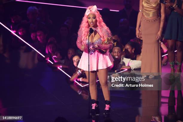 Nicki Minaj accepts the Michael Jackson Video Vanguard Award onstage at the 2022 MTV VMAs at Prudential Center on August 28, 2022 in Newark, New...