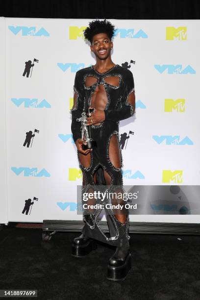 Lil Nas X winner of the Best Collaboration award for 'Industry Baby' poses in the press room at the 2022 MTV VMAs at Prudential Center on August 28,...