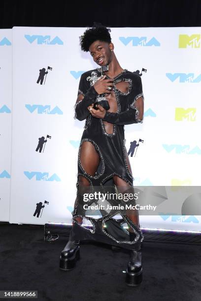 Lil Nas X winner of the Best Collaboration award for 'Industry Baby' poses in the press room at the 2022 MTV VMAs at Prudential Center on August 28,...