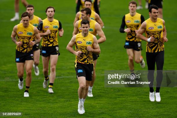 Players warm up before during a Richmond Tigers AFL training session at Punt Road Oval on August 29, 2022 in Melbourne, Australia.