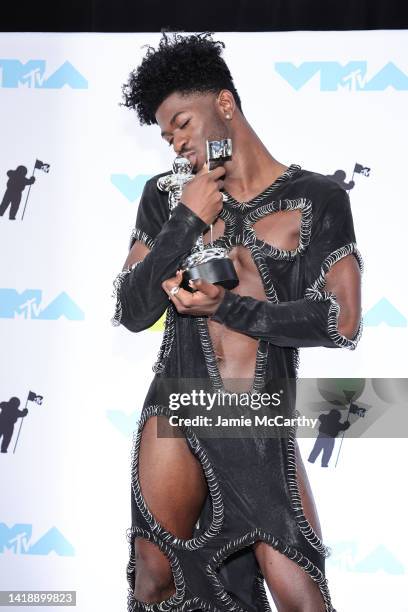 Lil Nas X winner of the Best Collaboration award for 'Industry Baby' poses in the press room at the 2022 MTV VMAs at Prudential Center on August 28,...