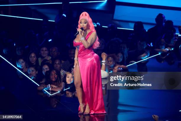 Nicki Minaj speaks onstage at the 2022 MTV VMAs at Prudential Center on August 28, 2022 in Newark, New Jersey.