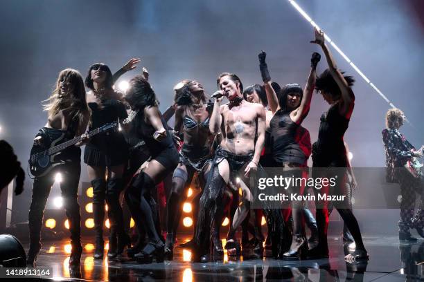 Victoria De Angelis, Damiano David, and Thomas Raggi of Måneskin perform onstage at the 2022 MTV VMAs at Prudential Center on August 28, 2022 in...