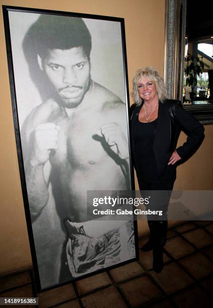 Brenda Glur-Spinks poses with a picture of her late husband, Leon Spinks during his celebration of life and memorial service at The Modern Showrooms...