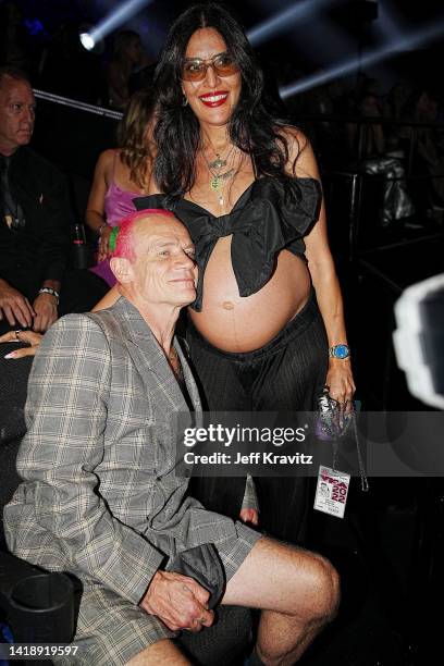 Flea of Red Hot Chili Peppers and Melody Ehsani at the 2022 MTV VMAs at Prudential Center on August 28, 2022 in Newark, New Jersey.
