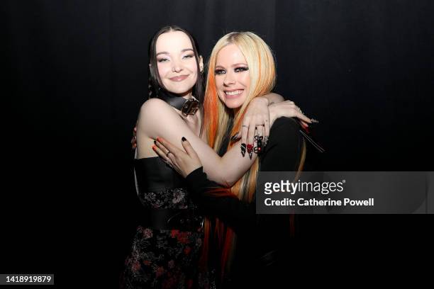 Dove Cameron and Avril Lavigne seen backstage at the 2022 MTV VMAs at Prudential Center on August 28, 2022 in Newark, New Jersey.