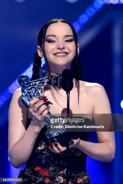 Dove Cameron accepts the Best New Artist award onstage at the 2022 MTV VMAs at Prudential Center on August 28, 2022 in Newark, New Jersey.