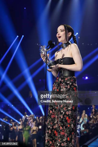 Dove Cameron accepts the Best New Artist award onstage at the 2022 MTV VMAs at Prudential Center on August 28, 2022 in Newark, New Jersey.
