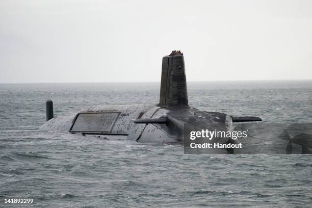 In this handout image provided by MoD Crown Copyright, HMS Vengeance departs for Devonport prior to re-fit on Ferbruary 27, 2012 off the coast of...