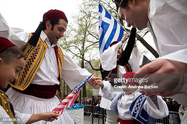 Men and children dance on a parade float during the annual Greek Independence Day Parade on March 25, 2012 in New York City. It was the 191st annual...
