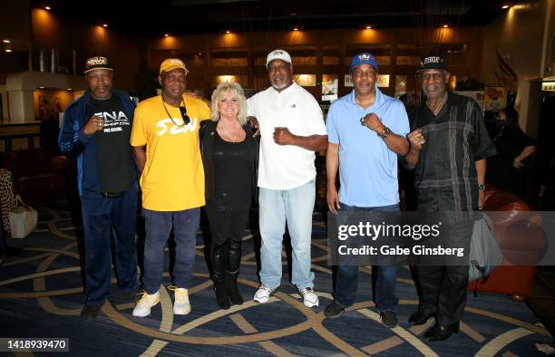 Former boxer and mixed martial artist Ray Mercer, a guest, Brenda Glur-Spinks, former boxers Henry Tillman, Michael Nunn and Michael Spinks attend...