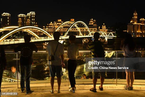 Tourists visit the Youth Square on August 28, 2022 in Fuzhou, Fujian Province of China. Dubbed 'the Bund of Fuzhou', the Youth Square has become a...