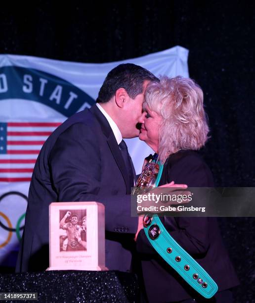 World Boxing Council President Mauricio Sulaimán presents Brenda Glur-Spinks with a WBC World Champion belt during Leon Spinks celebration of life...