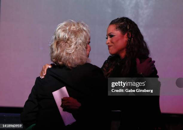 Brenda Glur-Spinks hugs author Rasheda Ali after her speech during Leon Spinks celebration of life and memorial service at The Modern Showrooms at...