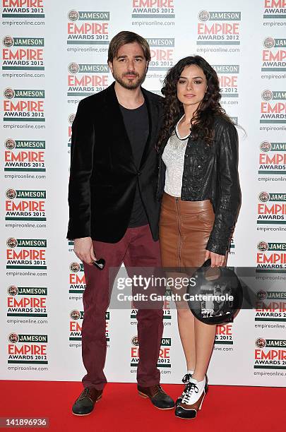 Ozge Ozipinric and Engin Altan Duzyatan attends the 2012 Jameson Empire Awards at the Grosvenor House Hotel on March 25, 2012 in London, England.