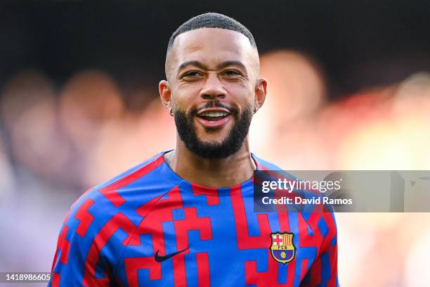 Memphis Depay of FC Barcelona looks on during the warm up prior to the La Liga Santander match between FC Barcelona and Real Valladolid CF at Camp...