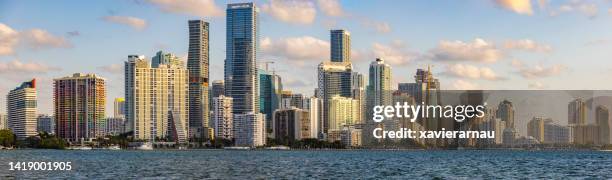 brickell skyline at sunrise usa - miami skyline daytime stock pictures, royalty-free photos & images