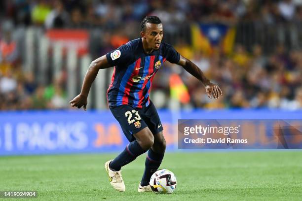Jules Kounde of FC Barcelona runs with the ball during the La Liga Santander match between FC Barcelona and Real Valladolid CF at Camp Nou on August...