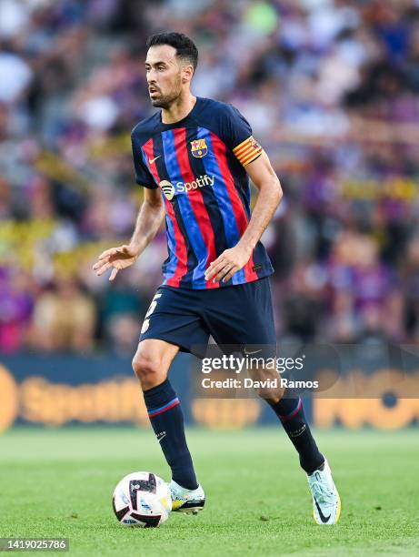 Sergio Busquets of FC Barcelona runs with the ball during the La Liga Santander match between FC Barcelona and Real Valladolid CF at Camp Nou on...