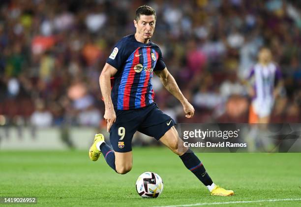 Robert Lewandowski of FC Barcelona runs with the ball during the LaLiga Santander match between FC Barcelona and Real Valladolid CF at Camp Nou on...