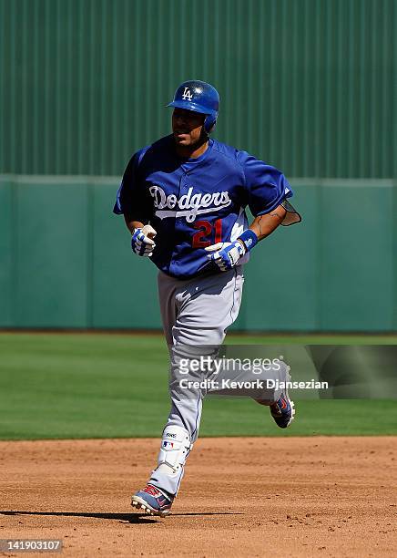 Juan Rivera of the Los Angeles Dodgers plays against the Los Angeles Angels of Anaheim at Tempe Diablo Stadium on March 12, 2012 in Tempe, Arizona.