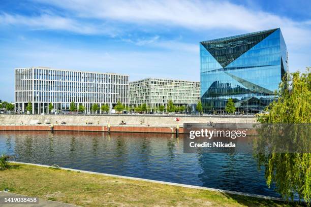 berlin's modern main train station district - river spree stock pictures, royalty-free photos & images