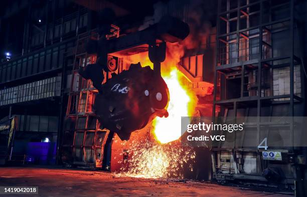 Sparks fly from a furnace at a steel plant on August 12, 2022 in Jiujiang, Jiangxi Province of China.