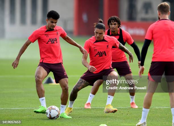 Luis Diaz and Darwin Nunez of Liverpool during a training session at AXA Training Centre on August 29, 2022 in Kirkby, England.