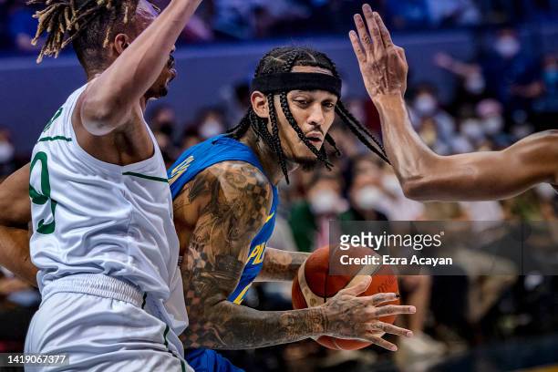 Jordan Clarkson of Team Philippines competes against Musab Tariq M Kadi of Team Saudi Arabia during the FIBA World Cup Asian Qualifier Group E...