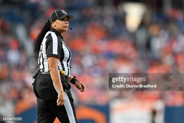 Line judge Maia Chaka looks on as she officiates during a preseason NFL game between the Denver Broncos and the Minnesota Vikings at Empower Field at...