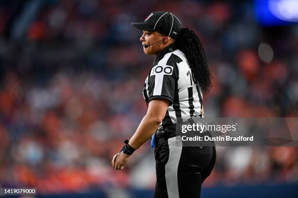 Line judge Maia Chaka looks on during a preseason NFL game between the Denver Broncos and the Minnesota Vikings at Empower Field at Mile High on...