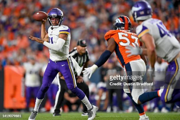 Quarterback Kellen Mond of the Minnesota Vikings looks to pass against the Denver Broncos in the second half of a preason NFL game at Empower Field...