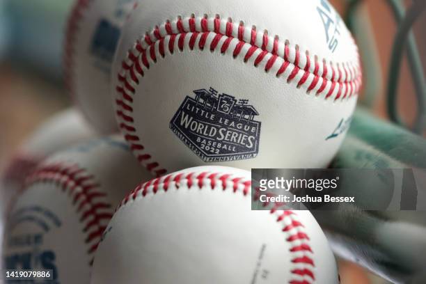 Baseballs are shown stacked before the Little League World Series consolation game between the Asia-Pacific Region team from Taipei City, Chinese...