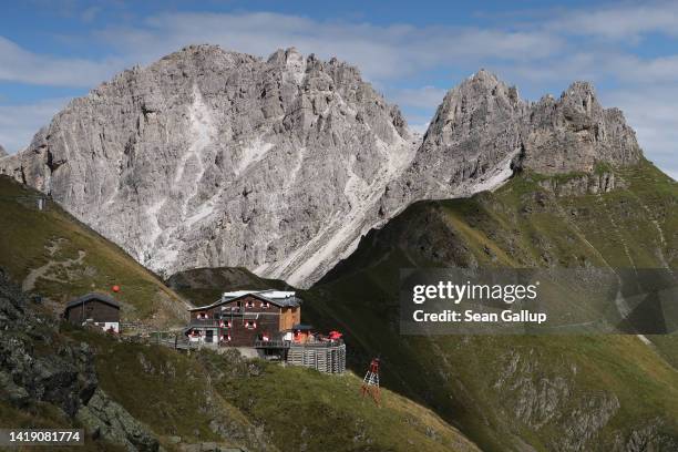 The Innsbrucker Hütte mountain hut stands in the Stubai Alps mountain range on August 25, 2022 near Neustift im Stubaital, Austria. The hut lies on...