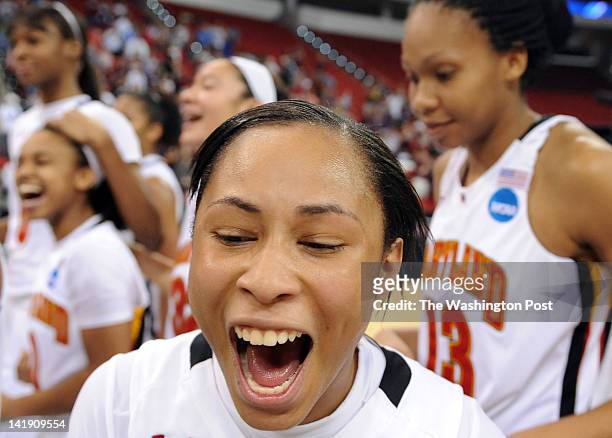 Maryland Terrapins guard Brene Moseley screams after defeating the Texas A&amp;M Aggies 81-74 to win the Regional Semifinal game of the Women's NCAA...