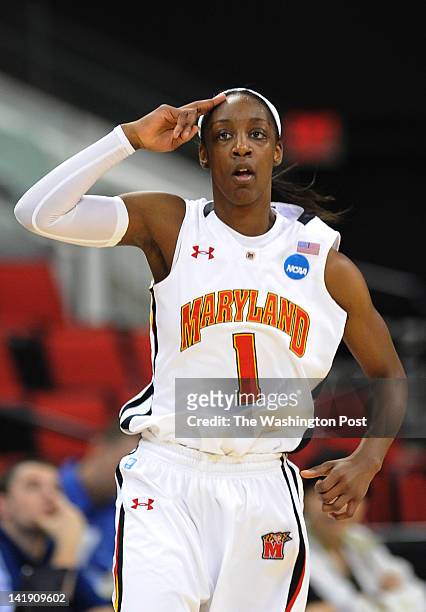 Maryland Terrapins guard Laurin Mincy salutes the crowd after hitting a three point shot against the Texas A&amp;M Aggies during a Regional Semifinal...
