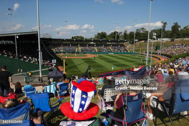 Fans watch the Little League World Series Championship game between the West Region team from Honolulu, Hawaii and the Caribbean Region team from...