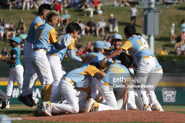 Players from the West Region team from Honolulu, Hawaii celebrate winning the Little League World Series Championship game 13-3 against the Caribbean...